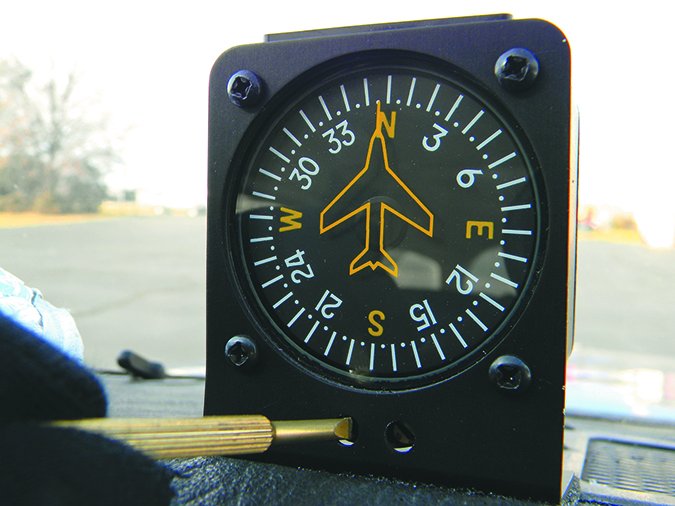 adjusting an aircraft sight compass