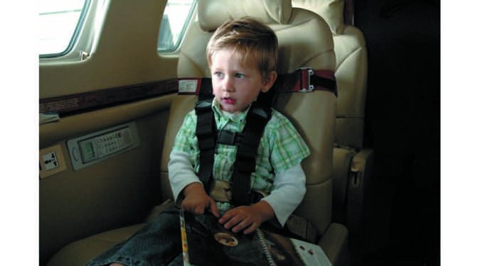 child wearing seatbelt
