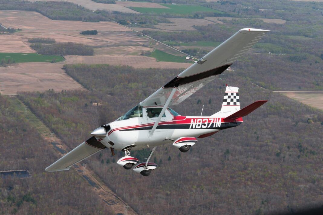 That’s Mark Kolanowski’s A150K aerobat in the lead photo (credit for the good air-to-air snap goes to Gage Altrock). Kolanowski said his 150 is a good camera plane partly because it flies well hands off, and fine course corrections can be made by weight-shifting and opening windows.